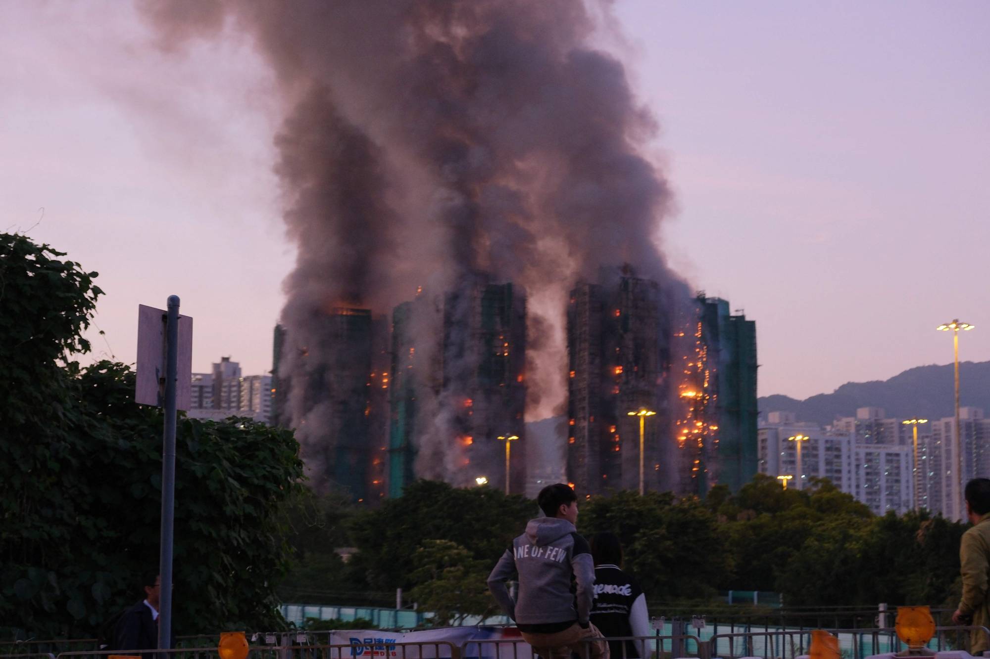 Hong Kong faces low election turnout as residents mourn deadly fire